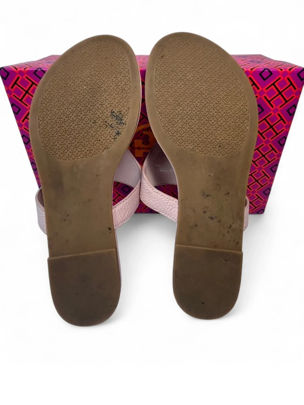 the Tory Burch Jolie Flat Thong Sandals in Sea Shell Pink tumbled leather. 6.5